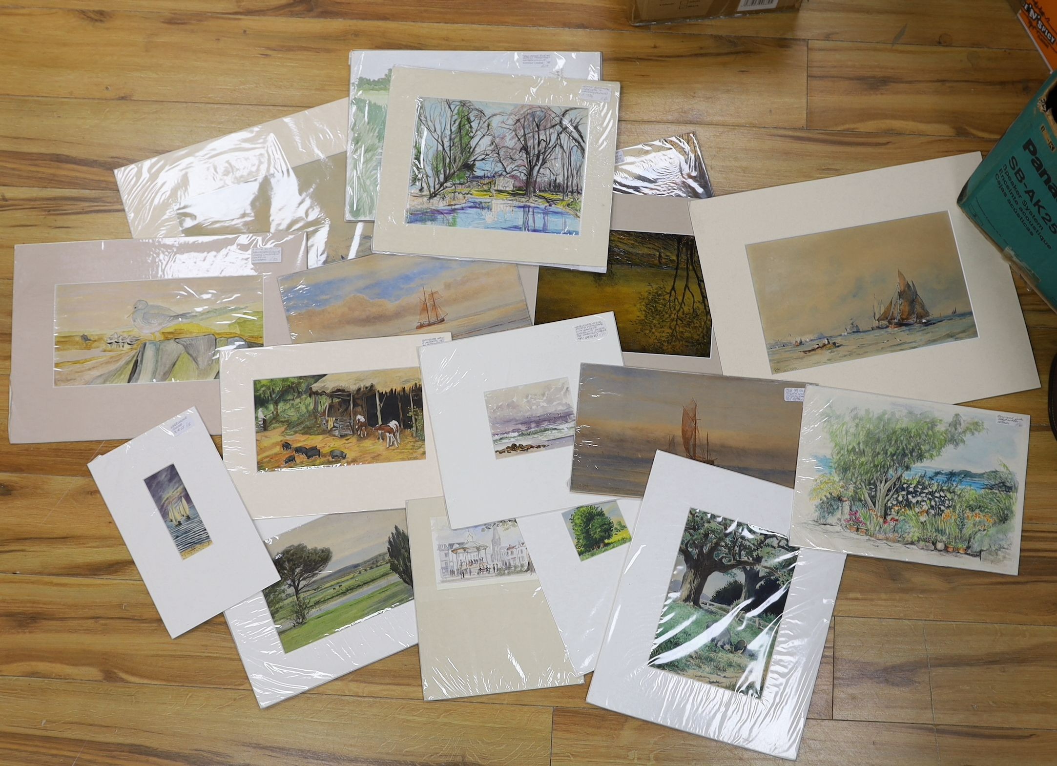 A collection of assorted unframed watercolours, all mounted with retail labels including W. Philips, Grainger Smith, Dampier Freeman, and George Horobin, with a small group of minor framed pictures